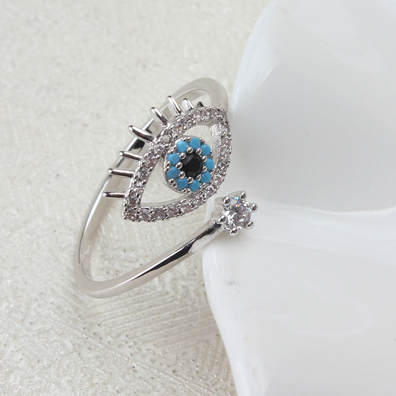 Anillo de diamantes con diseño de mal de ojo