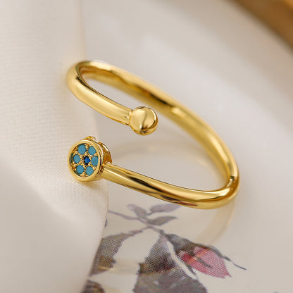 Anillo de ojo dorado con circonita cúbica